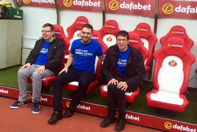 Nathan Bruce, volunteer coordiantor (Centre) with SAFC fans Paul and Michael who attend NEAS Day Services