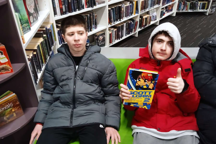 Exploring options in the library - North East Autism Society